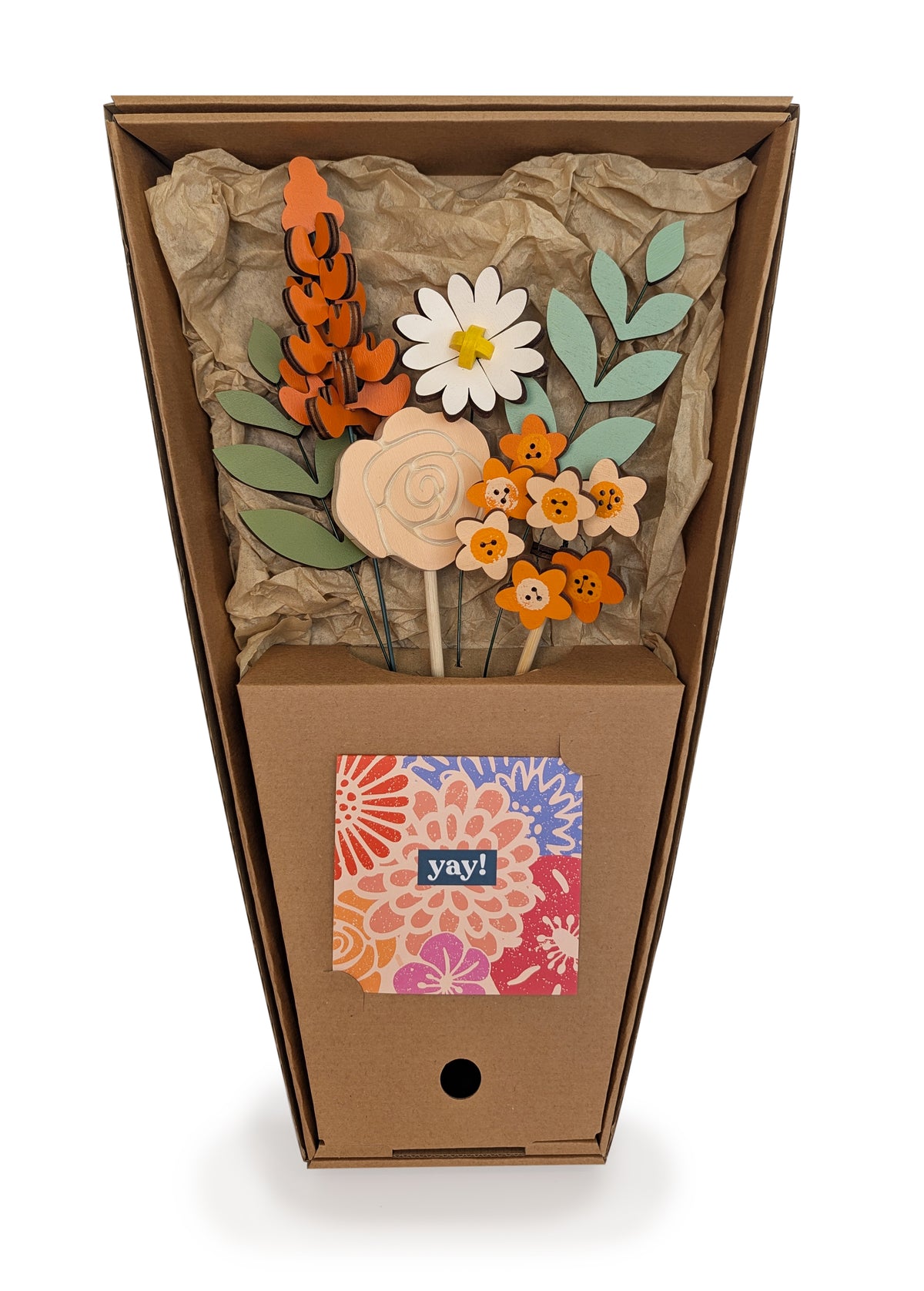 Signature Blooms in Satsuma, four wooden blooms and two foliage stems in warm orange, in its open box with the stems held in place