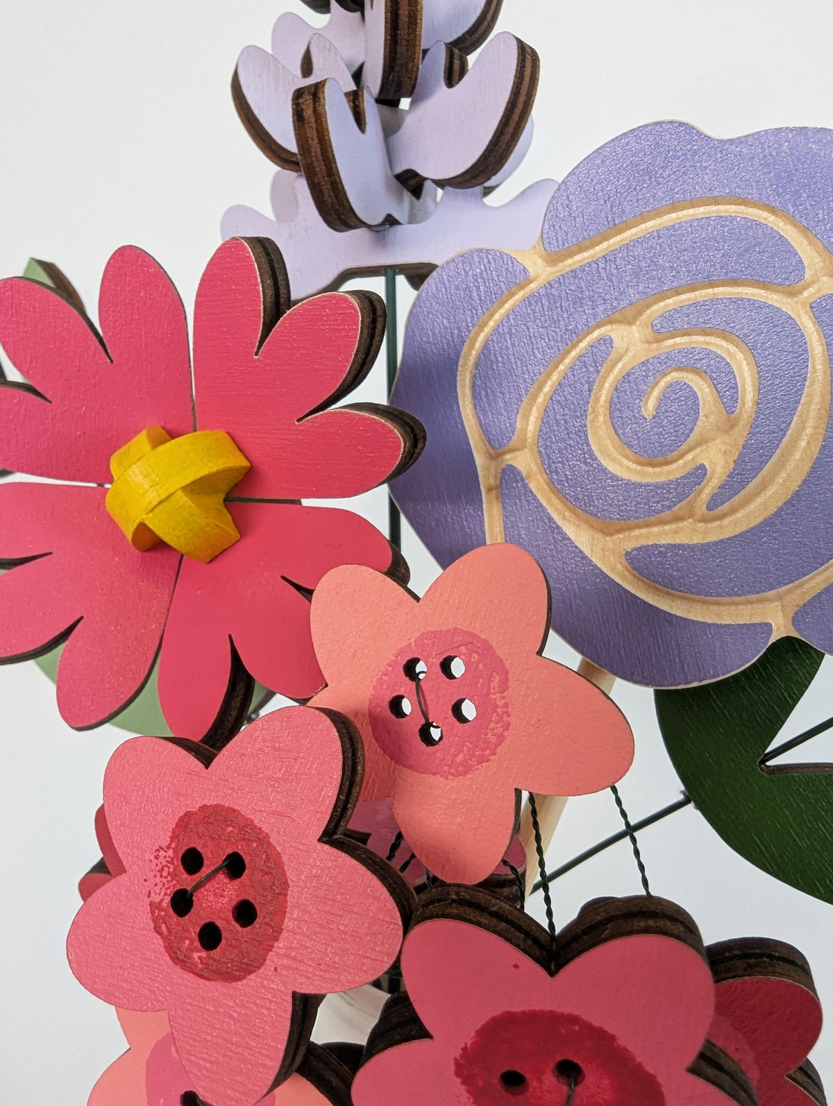 Signature Blooms in Macaron, a macro detail of the painted facets in bright pink and violet